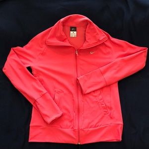 Nike DriFit zip up jacket in pink